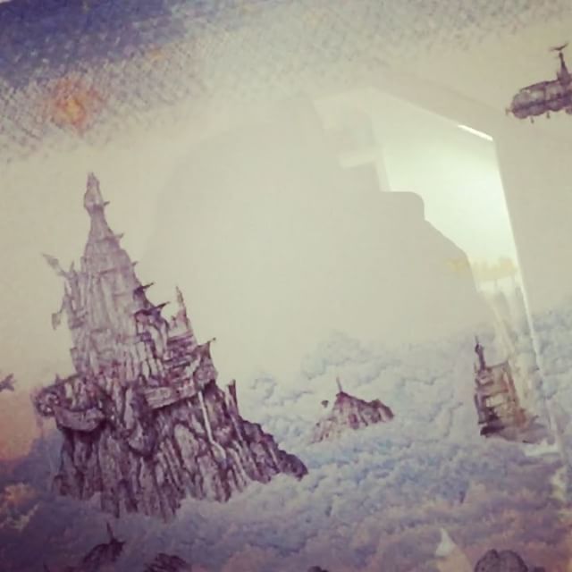 Somewhat poorly lit exploration of my large #cloudtoparchipelago drawing. #penandink #rotring #illustration #map #mountains #airships #fantasyart #rohrerandklingner #slomo #castles