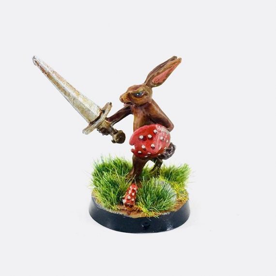 A rare bit of painting- @skullandcrown_inc  killer rabbit #medievalmarginalia #killerbunnies #rabbit #tabletopminiatures #paintingminiatures